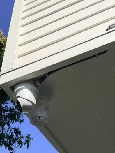 PTZ camera mounted on building exterior