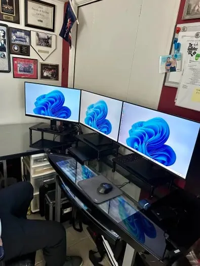 Custom triple monitor workstation build running Windows 11
